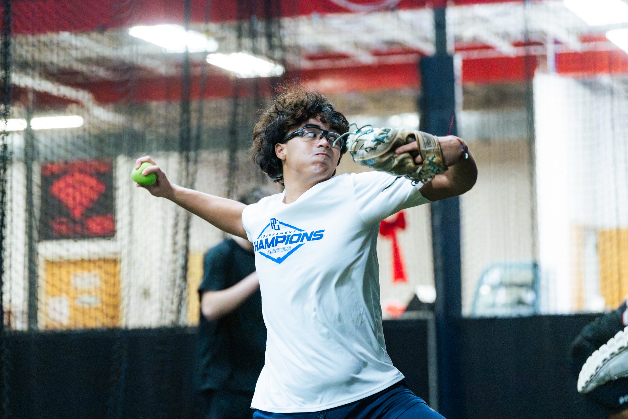 Athlete throwing weighted ball
